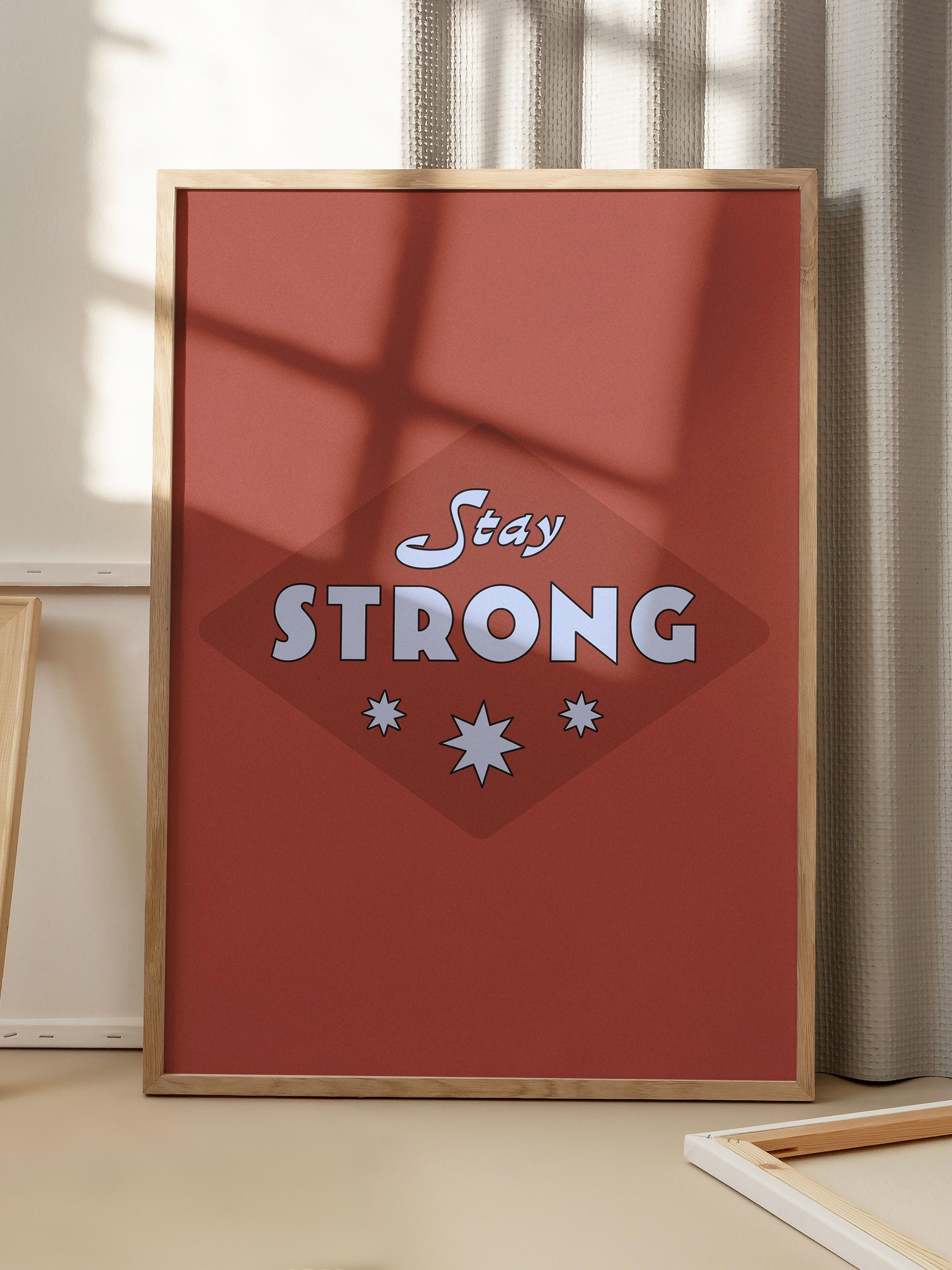 Printed poster with Stay Strong inspirational quote