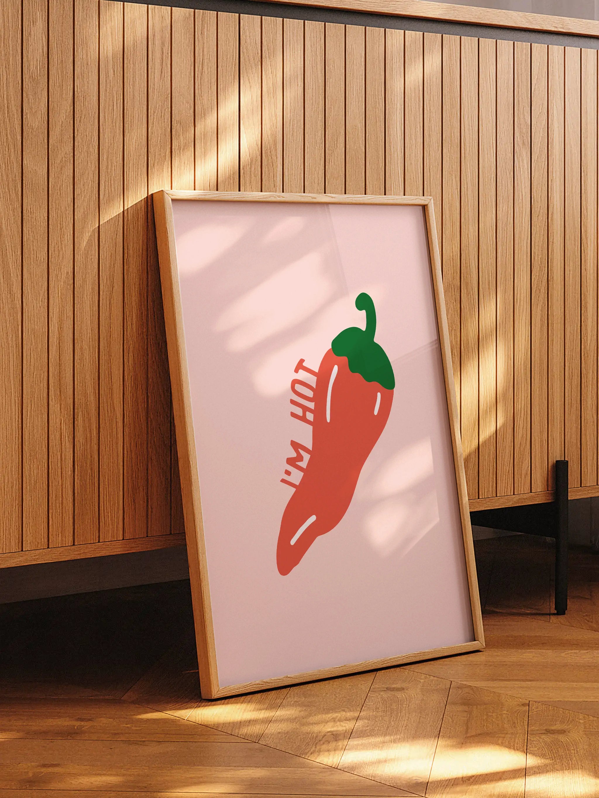 Funny food pun wall art featuring a chili pepper and bold typography.